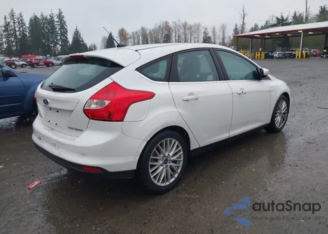 2014 Ford Focus Titanium from USA, damaged, VIN 1FADP3N25EL375578
